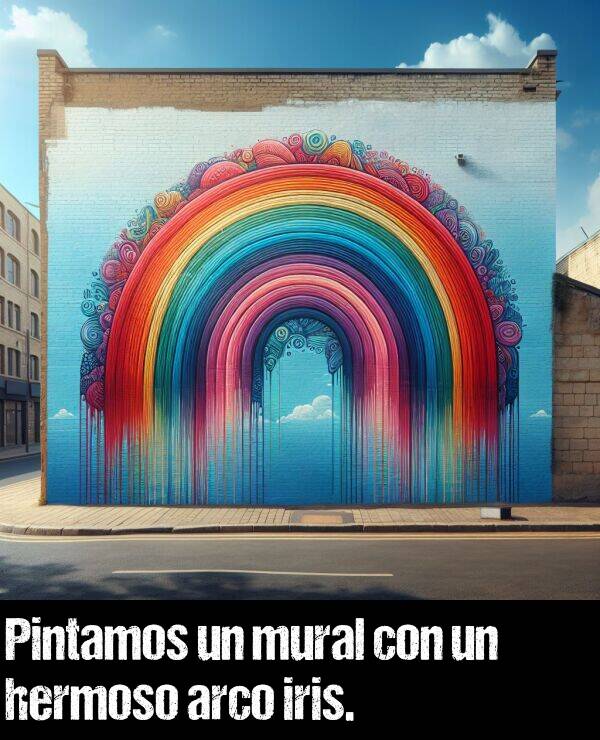 mural: Pintamos un mural con un hermoso arco iris.