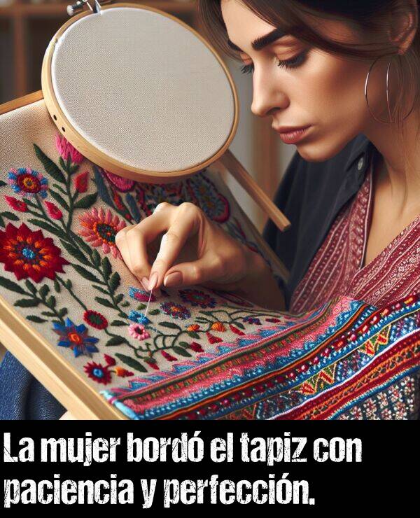 paciencia: La mujer bord el tapiz con paciencia y perfeccin.